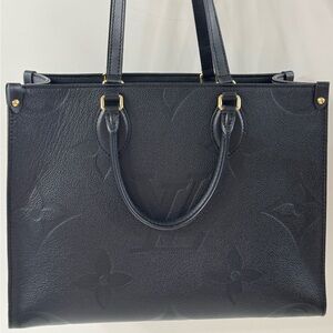Louis Vuitton ON-THE-GO MM Black Leather Embossed Monogram